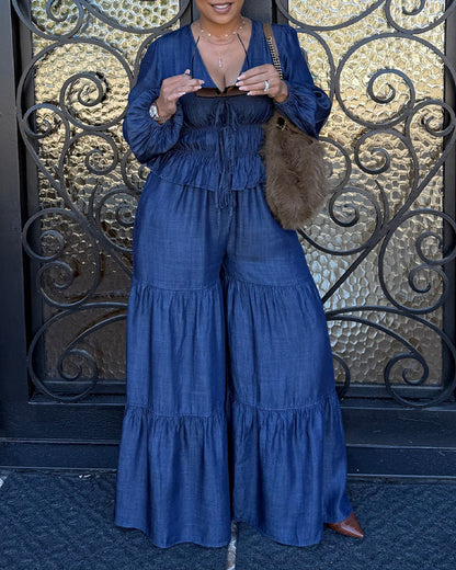 Set composto da top in finto denim con maniche a lanterna, scollo a V profondo e allacciatura sul davanti e pantaloni casual a zampa larghi 💙✨