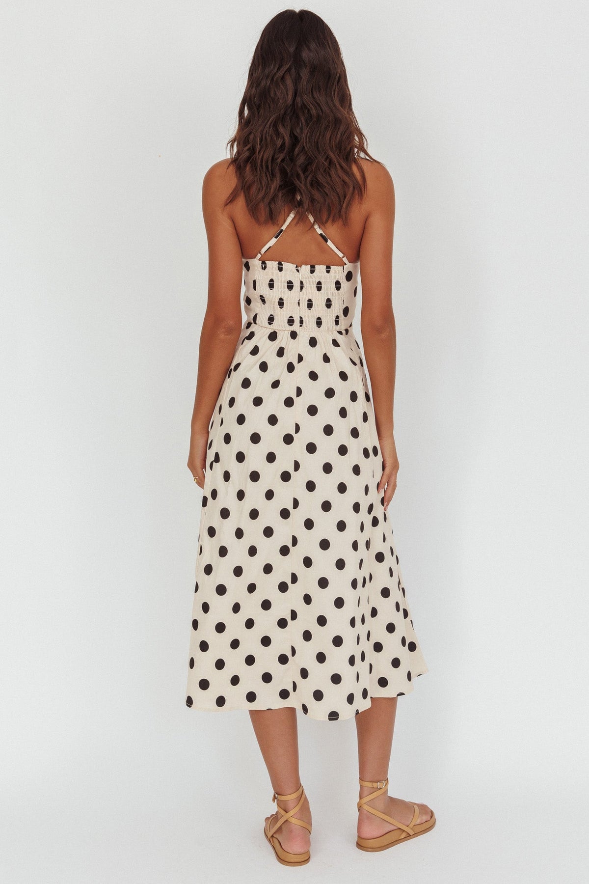 Abito midi a pois beige con scollo incrociato sulla schiena