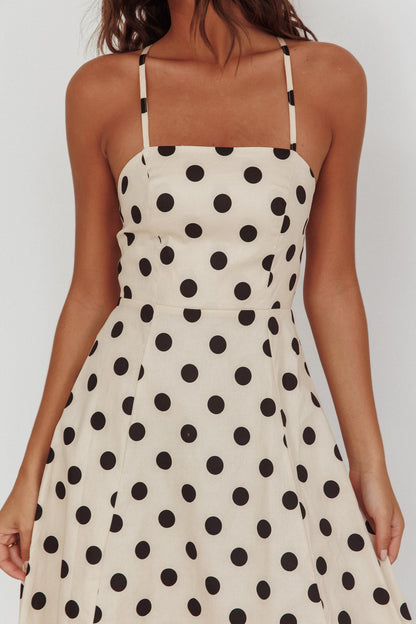 Abito midi a pois beige con scollo incrociato sulla schiena
