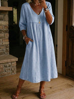 Abito casual dalla linea morbida in lino e cotone con inserti patchwork e bordi in pizzo