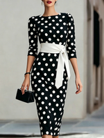Elegante abito elasticizzato con stampa artistica a pois