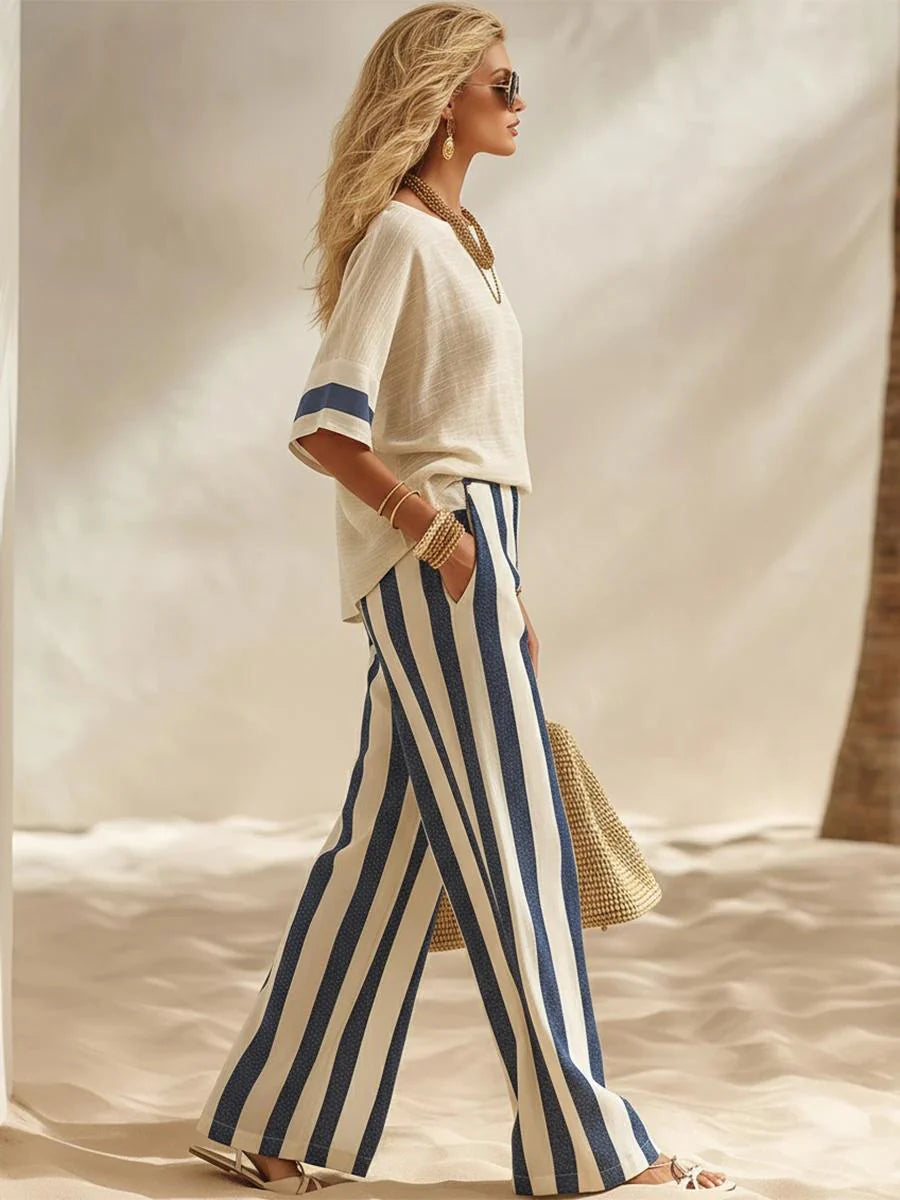 Set composto da top in misto cotone e lino con effetto testurizzato e blocchi di colore e pantaloni a gamba larga con elastico in vita a righe blu e bianche
