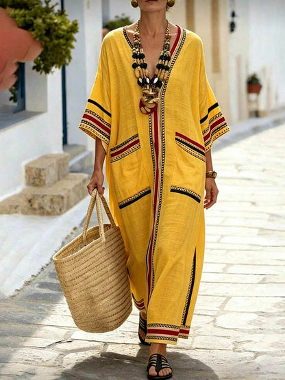 Abito casual e ampio in cotone e lino con stampa a contrasto, scollo a V e maniche a 3/4.