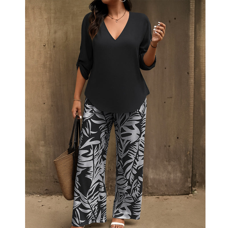 Set composto da camicetta con scollo a V e pantaloni a zampa stampati