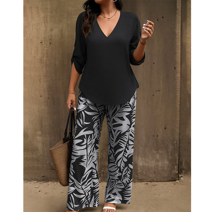 Set composto da camicetta con scollo a V e pantaloni a zampa stampati