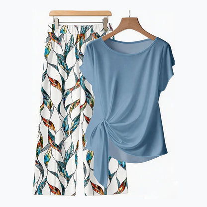 Set composto da top con lacci laterali e pantaloni fantasia – Modello morbido e regolabile – Un tocco tropicale e fresco