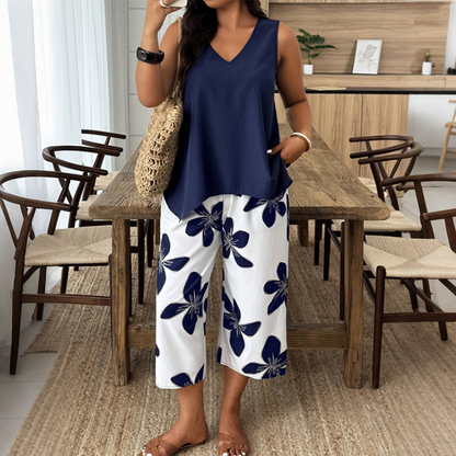 ✨ Completo da donna composto da top asimmetrico e pantaloni capri con fantasia floreale: versatile, colorato e comodo 🌺